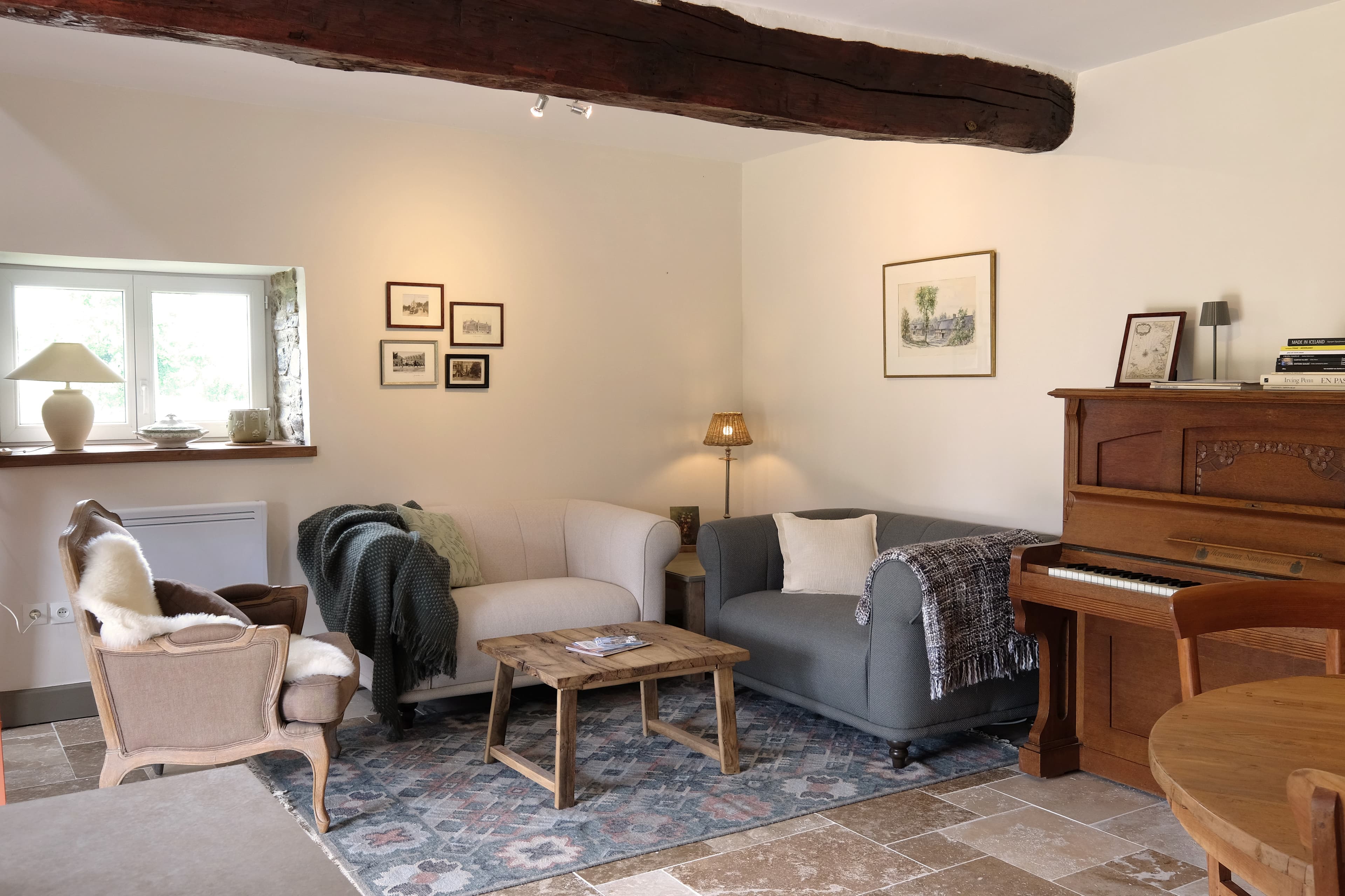 Gezellige woonkamer van Gite La Cour de Haut